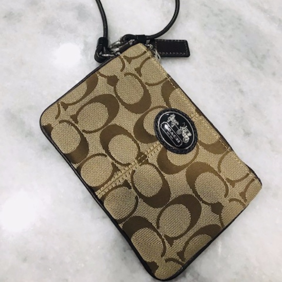 Coach Handbags - Beautiful Like-New Coach Wristlet
